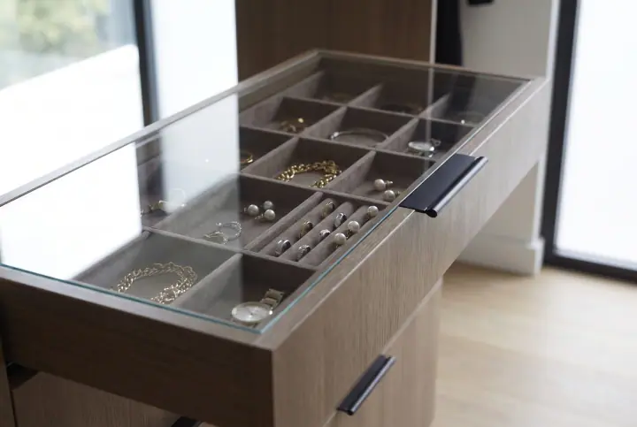 Design concept: jewellery drawer with a glass top inside a wardrobe