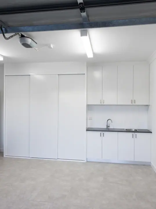 Garage cupboards with a bench and sink