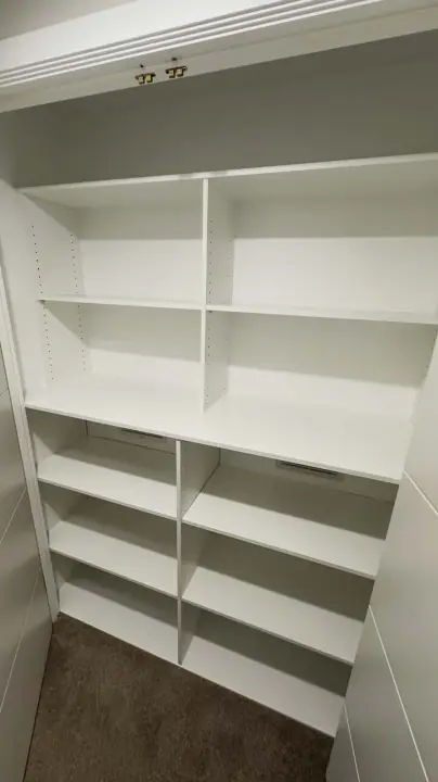Linen cupboard with deep adjustable shelving