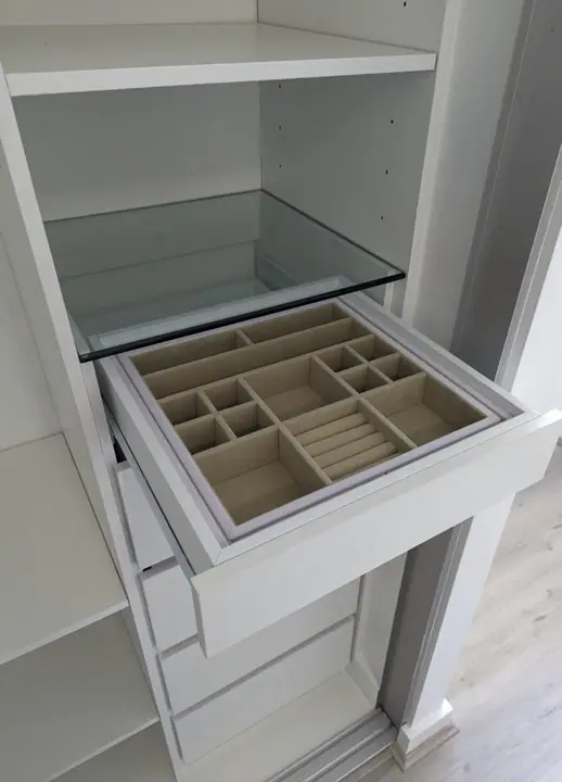 Jewellery drawer with glass top and felt-lined compartments