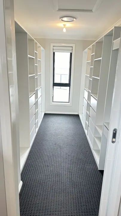 Re-fit with hanging and shelving around a window