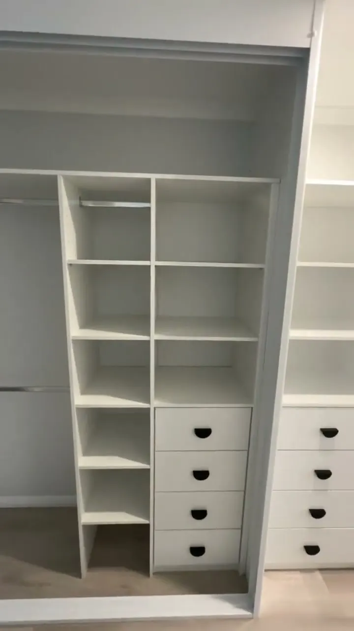 Video: walk-in wardrobe with a built-in desk, drawer bank and shelving