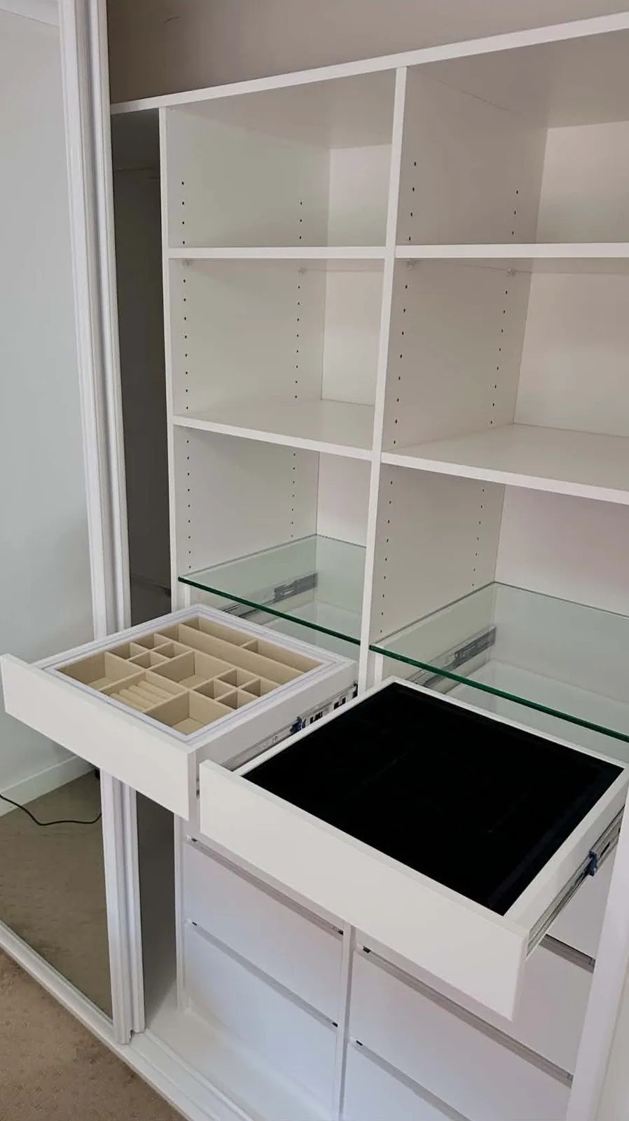 Swivel mirror swung out from inside a wardrobe