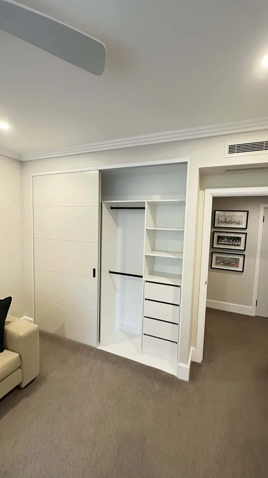 Wardrobe internals with hanging and drawers set at easy-reach heights