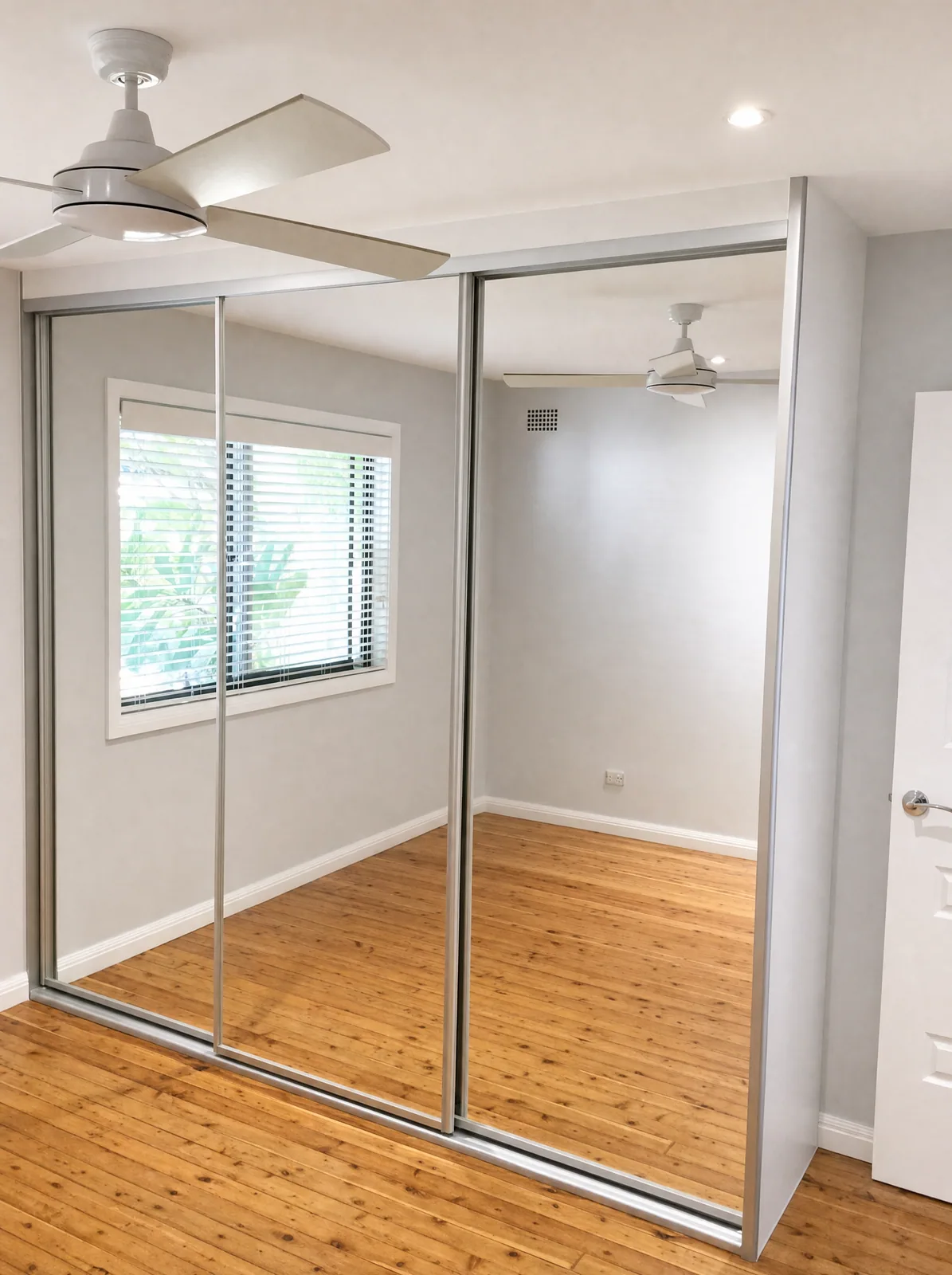 Sliding wardrobe doors on an aluminium top track