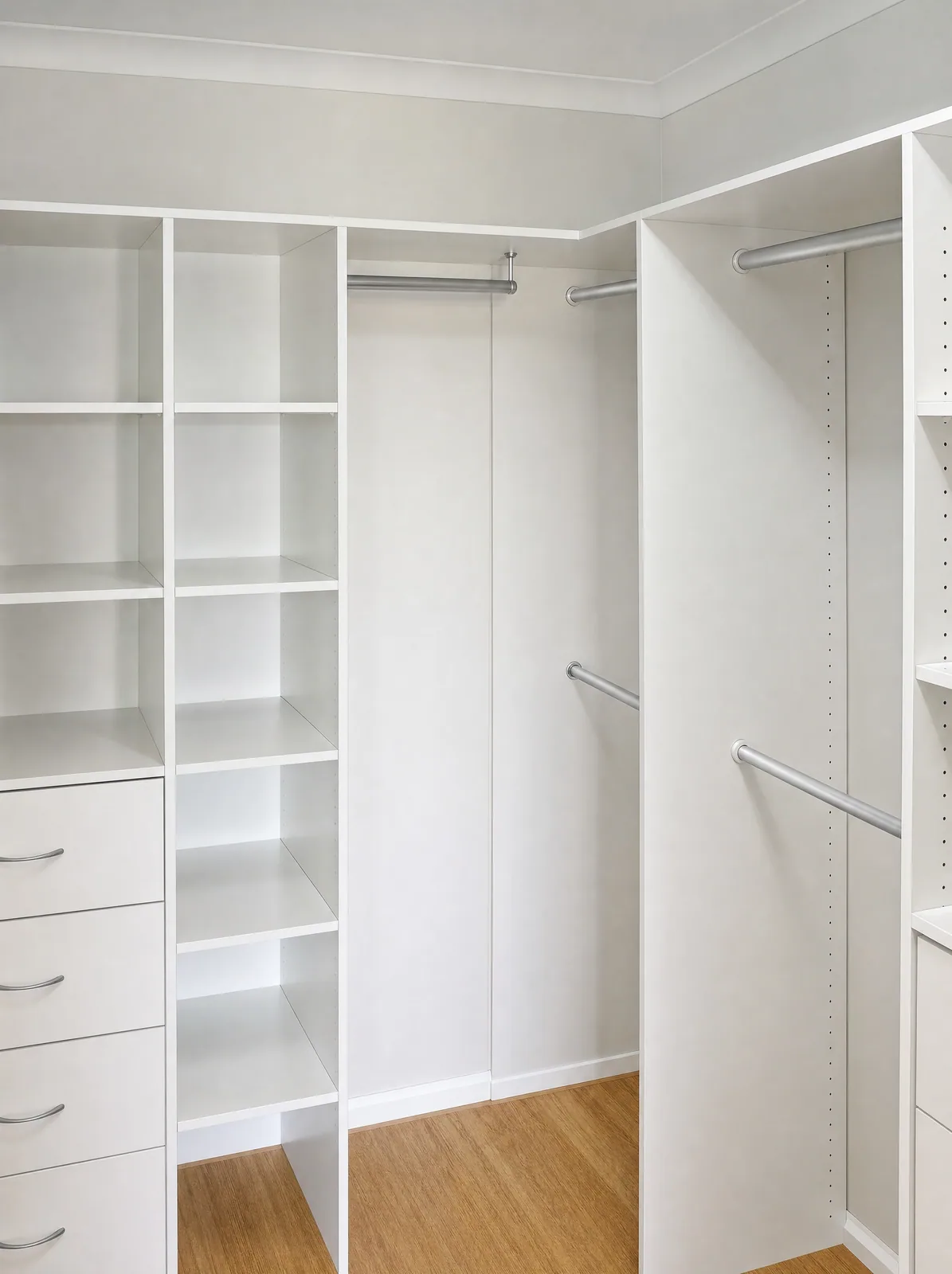 Open-plan walk-in wardrobe with shelving, hanging and drawers in a Penrith home