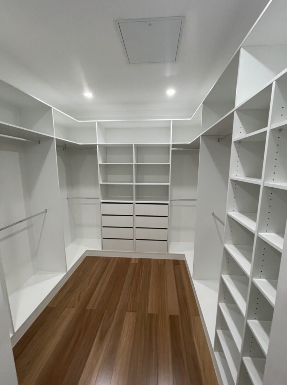 Walk-in wardrobe with dedicated angled shoe shelving